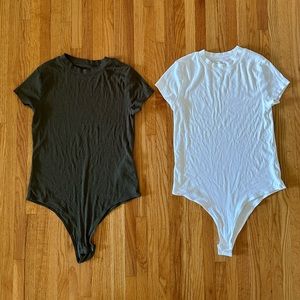 Two A New Day bodysuits